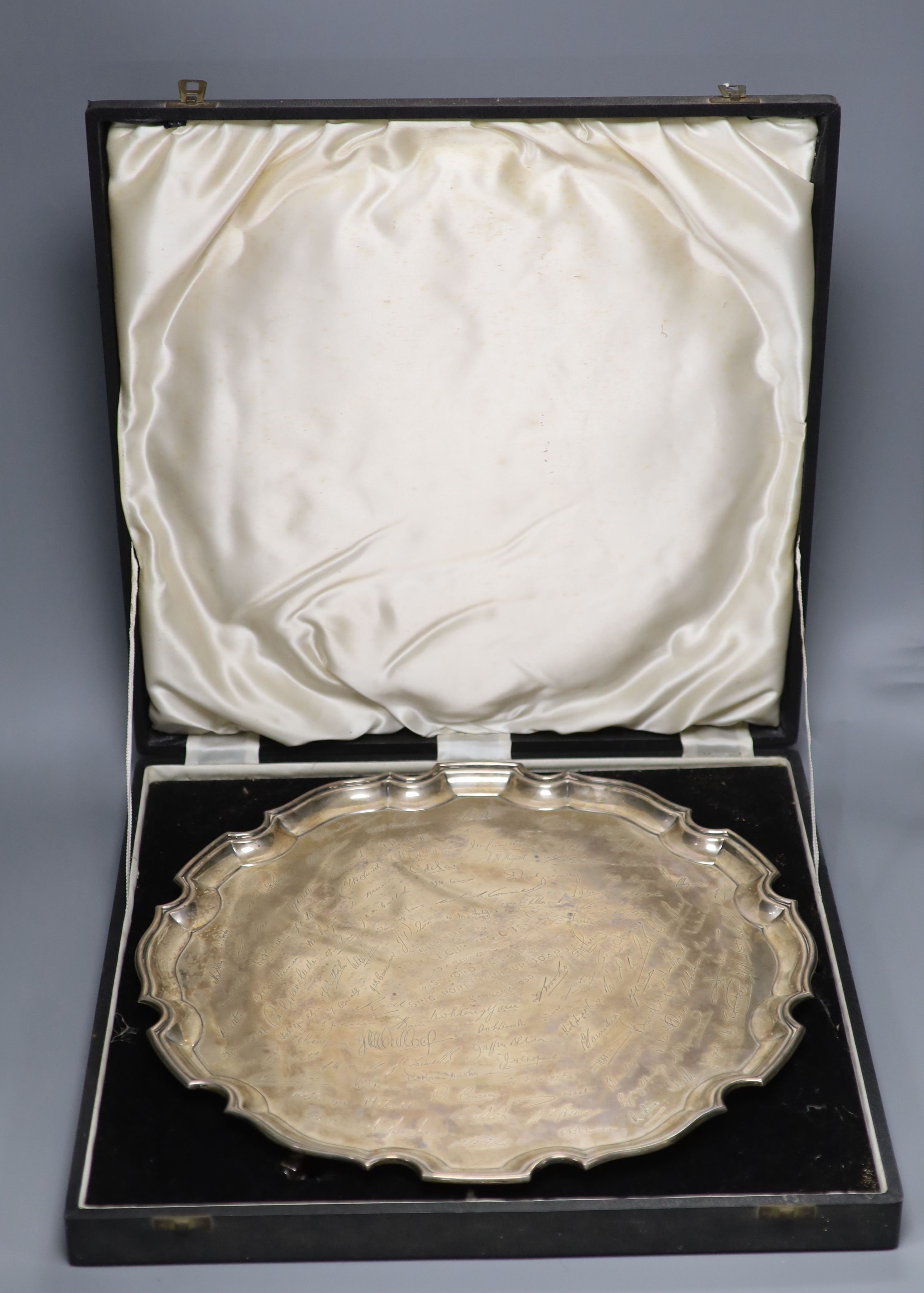 A large silver presentation salver with piecrust edge, 57.5oz